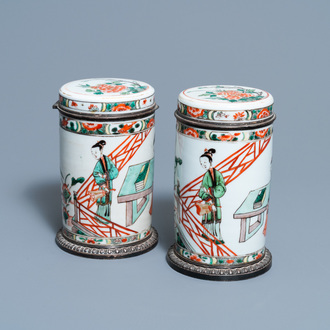 A pair of Chinese silver-mounted cylindrical famille verte covered jars, Kangxi