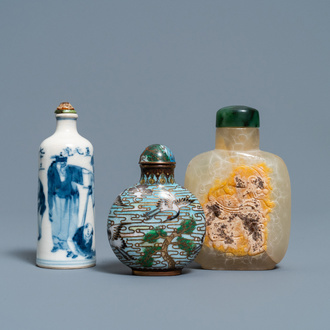 Three Chinese chalcedony, cloisonné and porcelain snuff bottles, 19th C.