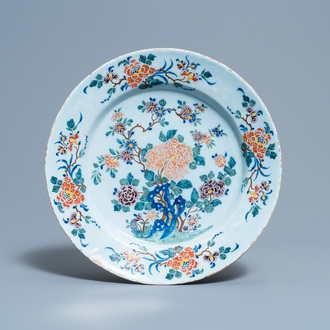 A polychrome Dutch Delft dish with fine floral design, 18th C.