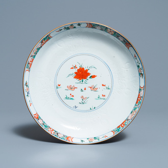 A Chinese famille verte 'mandarin ducks' dish with an incised lotus design, Kangxi
