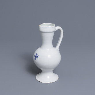 A blue and white jug with a heraldic cross, France or Germany, 17th C.