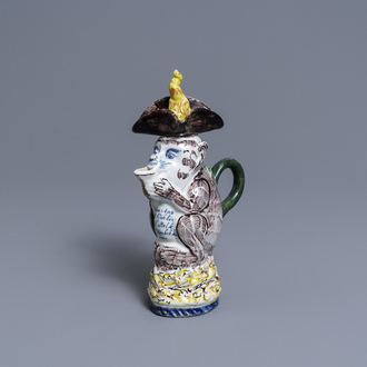 A polychrome Dutch Delft monkey ewer and cover, 18th C.