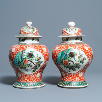 A pair of Chinese famille verte vases and covers, 19/20th C.