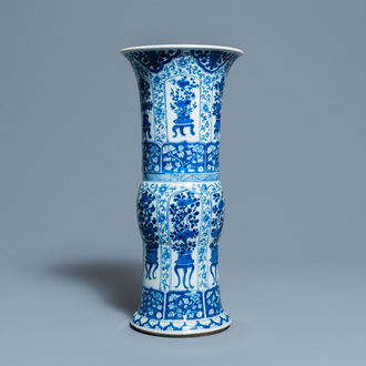 A Chinese blue and white 'gu' vase with flowery jardinières, Kangxi