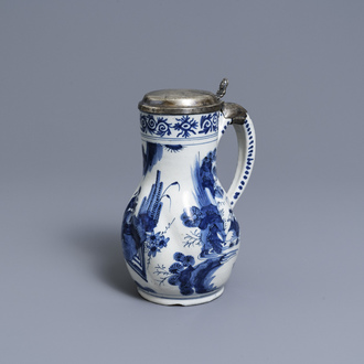 A silver-mounted Dutch Delft blue and white chinoiserie jug, 17th C.