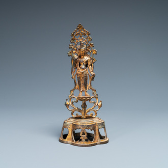 A Chinese gilt bronze figure of Buddha standing, probably Northern Wei dynasty