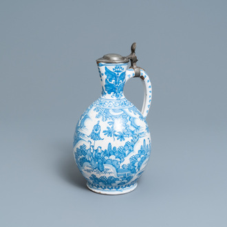 A large Dutch Delft blue and white chinoiserie jug with pewter cover, 17th C.