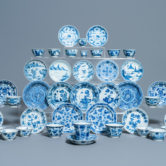 Nineteen Chinese blue and white cups and twenty-one saucers, Kangxi and later