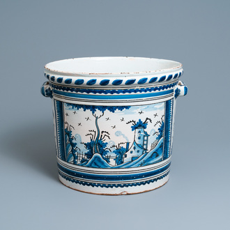A large blue, white and manganese 'landscape' jardinière, Nevers, France, 18th C.