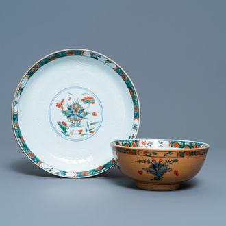 A Chinese capucine brown-ground famille verte plate and a bowl, Kangxi