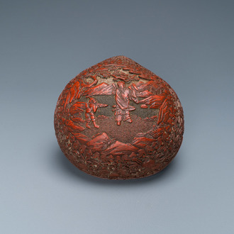 A Chinese red cinnabar lacquer peach-shaped box and cover, Kangxi