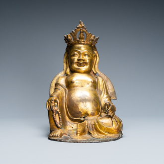 A Chinese gilt bronze figure of the seated Buddha, Ming