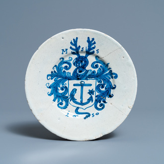 A blue and white Portuguese armorial plate, dated 1650