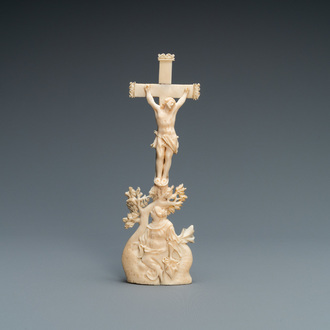 An ivory crucifixion group with Mary Magdalen beneath the cross, 18th C.