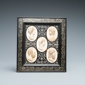 Five ivory portrait medallions set in a pewter-mounted ebony frame, France and/or Italy, 19th C.