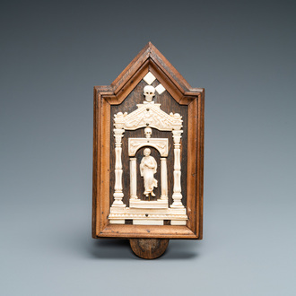 An ivory Madonna retable in wooden frame, 17/18th C.