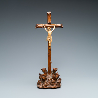 An ivory Corpus Christi on naturalistically carved wooden crucifix, probably France, 17/18th C.