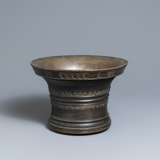 A large bronze mortar dated 1557 and inscribed for Martin Doeulle, North of France