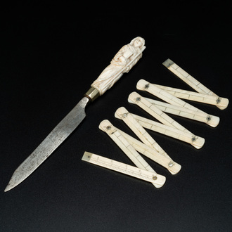 An ivory-handled knife depicting the theological virtue of faith and an ivory folding tailor's ruler, 17/18th and 19th C.