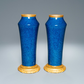 A pair of monochome powder blue Sèvres vases with gilded bronze mounts, 19th C.