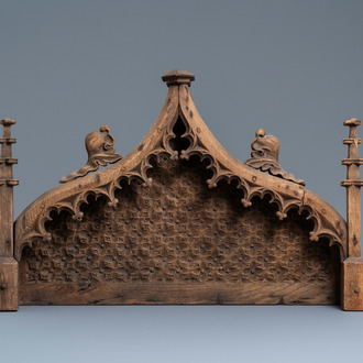 An arch-shaped carved oak baldachin or throne top, France, 15th C.