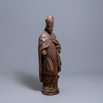 A large limewood figure of a bishop, 18th C.