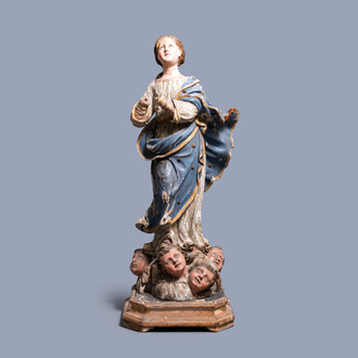 A large polychromed and gilded wooden 'Assumption of Our Lady' group with glass eyes, Italy, 17th C.