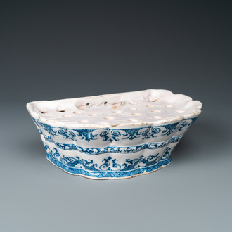 A blue and white Moustiers faience flower holder, France, 18th C.