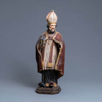A large polychromed wooden figure of Saint Amand, 17th C.