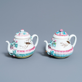 A pair of Chinese famille rose teapots and covers with applied design, Yongzheng