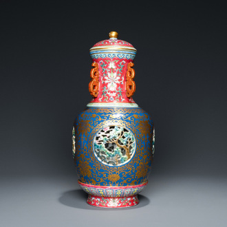 A four-piece Chinese famille rose revolving and reticulated vase, Qianlong mark, Republic