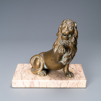 A bronze model of a lion on a marble base, 17th C.