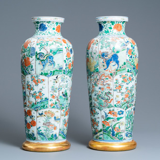 A pair of Chinese famille verte 'mythical animals' vases, Kangxi