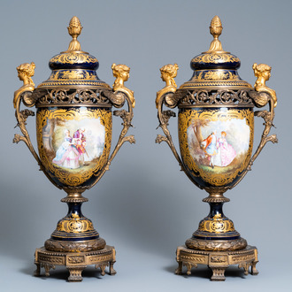 AA pair of large French Sèvres-style vases with gilded bronze mounts, signed Le Berre, 19th C.
