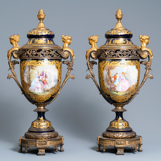 A pair of large French Sèvres-style vases with gilded bronze mounts, signed Le Berre, 19th C.