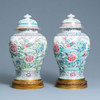 A pair of tall gilt bronze-mounted famille rose-style baluster vases and covers, Samson, Paris, 19th C.