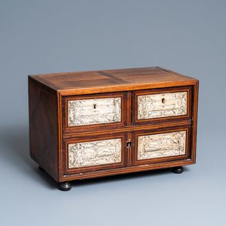A small mahogany veneer cabinet with engraved bone plaques, Italy, 17th C.
