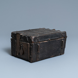 A chiseled leather-clad wooden travel casket, France, 15th C.