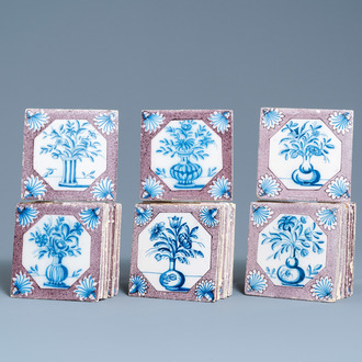 Twenty-five Dutch Delft blue, white and manganese flower vase tiles, 18th C.