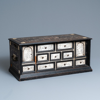 An ebony veneer cabinet with engraved ivory plaques, Italy, 17th C.