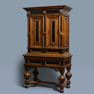 An oak and ebony two-door cabinet, The Low Countries, 17th C.