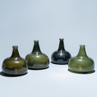 Four green glass wine bottles, 17/18th C.