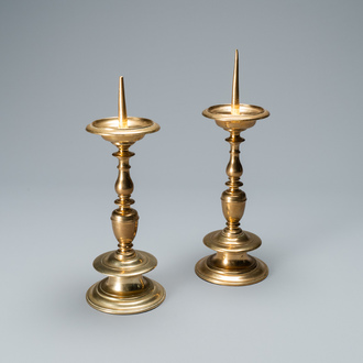 A pair of brass alloy candlesticks, Italy, 17th C.