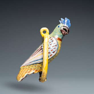 A polychrome Dutch Delft model of a parrot on a ring, 18th C.