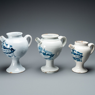 Three Dutch Delft blue and white wet drug jars, 18th C.