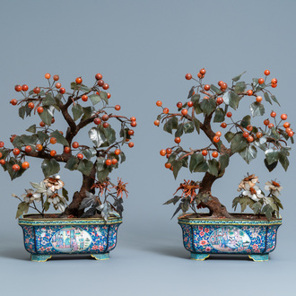 A pair of large Chinese Canton enamel jardinières with jade and hardstone trees, 19th C.