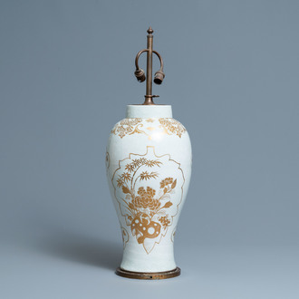 A Chinese parcel-gilt bianco-sopra-bianco vase mounted as a lamp, Qianlong