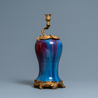 A Chinese flambé-glazed vase with gilt bronze candelabra mount, 19th C.