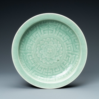 A Chinese monochrome celadon 'lotus' dish, Qianlong
