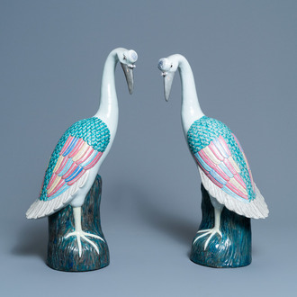 A pair of large Chinese famille rose models of cranes, 20th C.